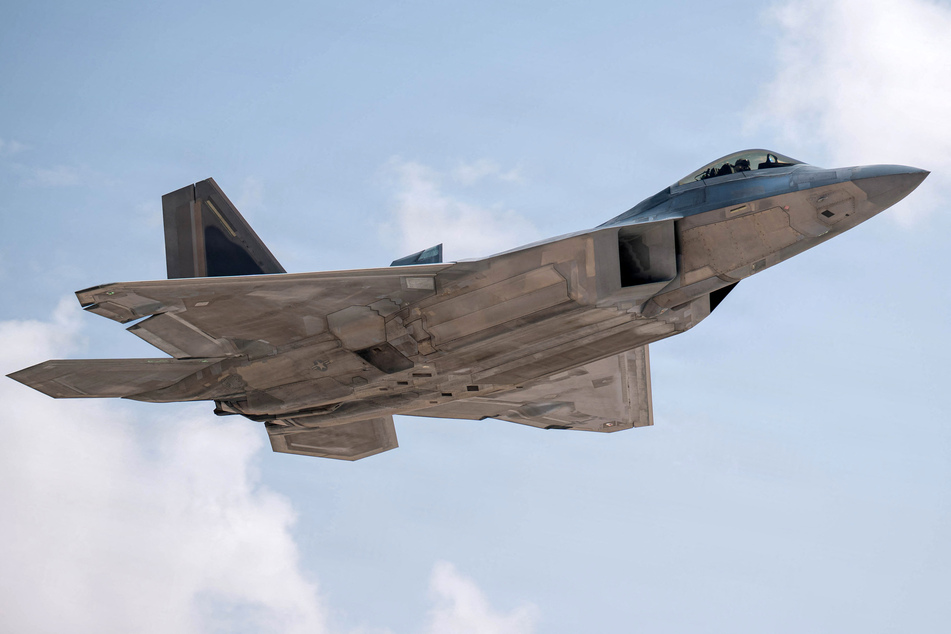 In this US Air Force handout photo released by US Central Command public affairs, a US Air Force F-22 Raptor aircraft takes flight in the US Central Command area of responsibility in support of Operation Epic Fury on March 20, 2026.