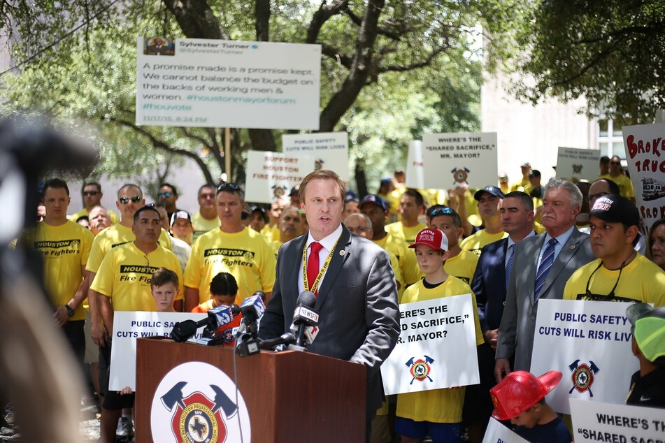Houston Professional Fire Fighters Association President Marty Lancton speaks at a protest in favor of Prop. B.