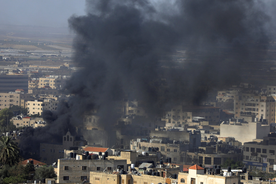 Israel war: West Bank suffers deadliest raid in decades as south Israel sees ballistic missiles