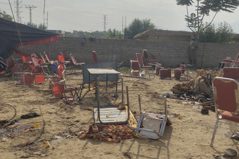 Items of clothing were left strewn around the site of the bombing, which injured more than 100 people.