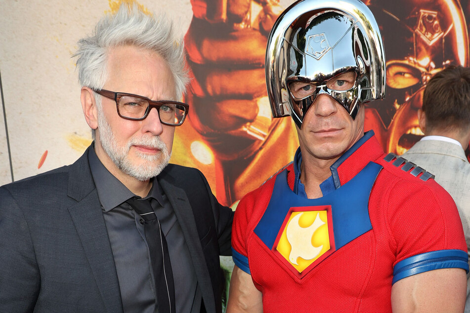 James Gunn (l) attends the premiere of The Suicide Squad with John Cena.