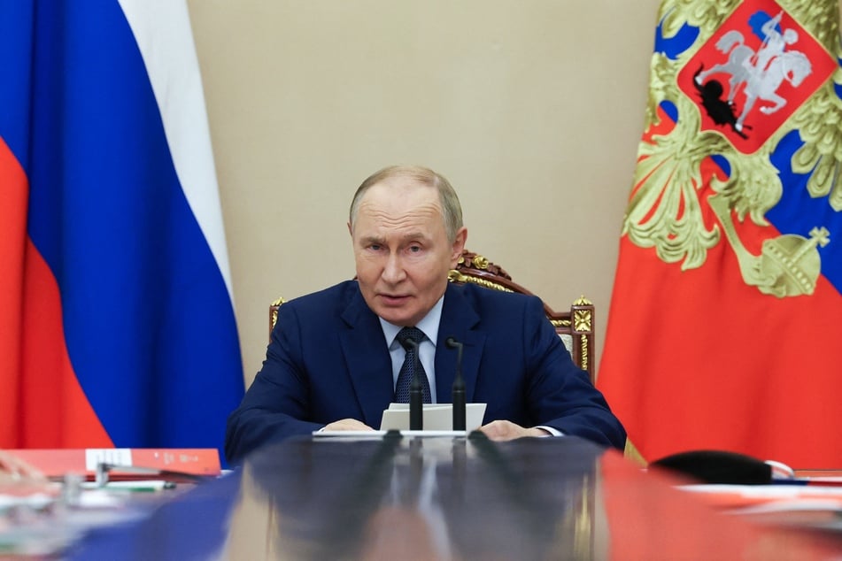 Russia's President Vladimir Putin chairs a Security Council meeting at the Kremlin in Moscow on Monday.