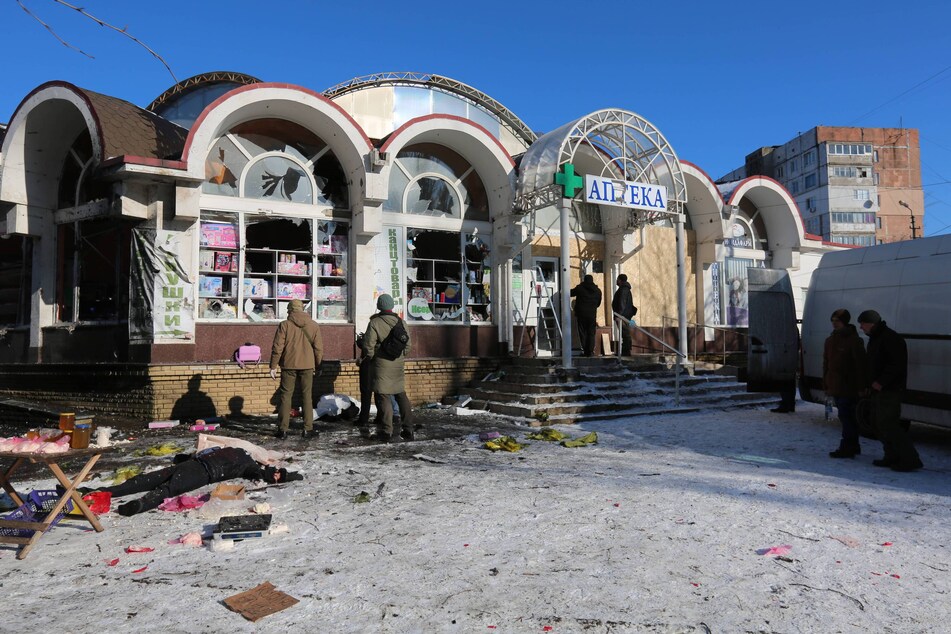 Ukraine accused of killing dozens in strike on busy Donetsk market