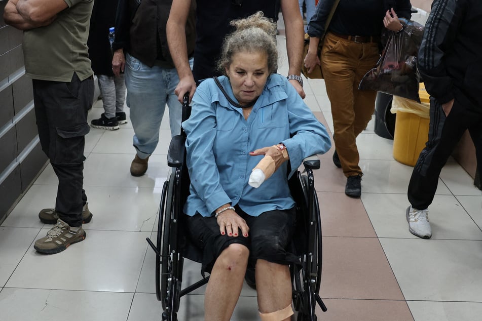 Heidi Levine leaves the emergency room of the government hospital in Ramallah after being treated following an attack by Israeli settlers on Friday. The US State Department condemned the "criminal violence" in the West Bank, but avoided criticism of the settlers.