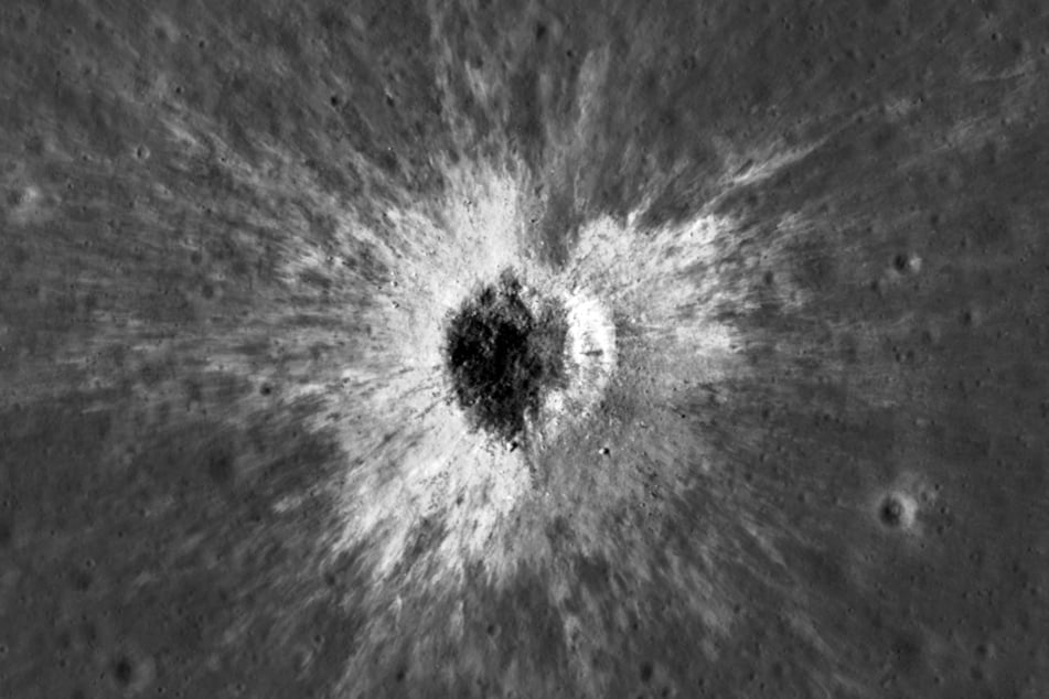 This handout picture published on September 16, 2026, by NASA shows a new crater on the Moon's surface, taken by the Lunar Reconnaissance Orbiter Camera.