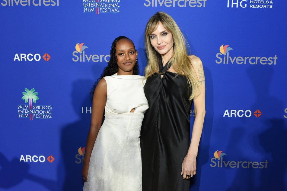 Two of Angelina Jolie's (r.) kids, including daughter Zahara, have formally dropped Pitt from their names.