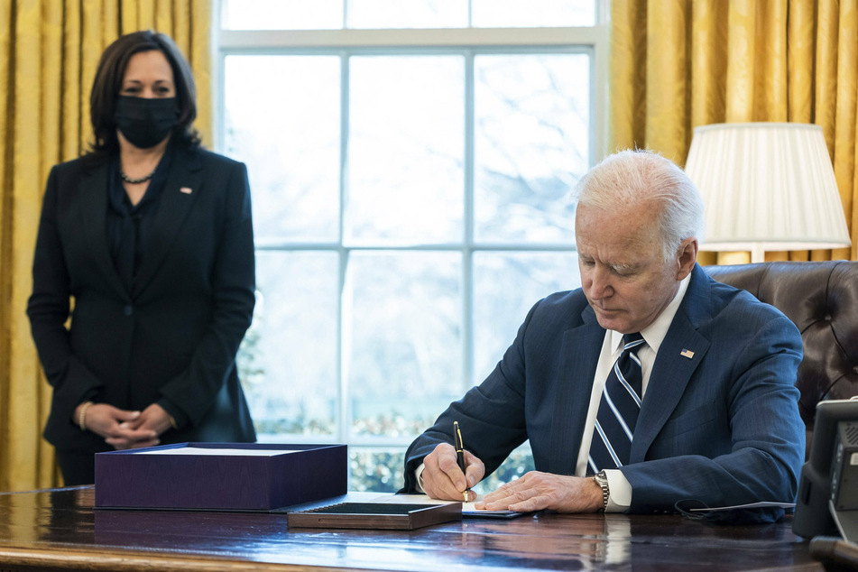 Biden signs historic stimulus bill on anniversary of pandemic declaration