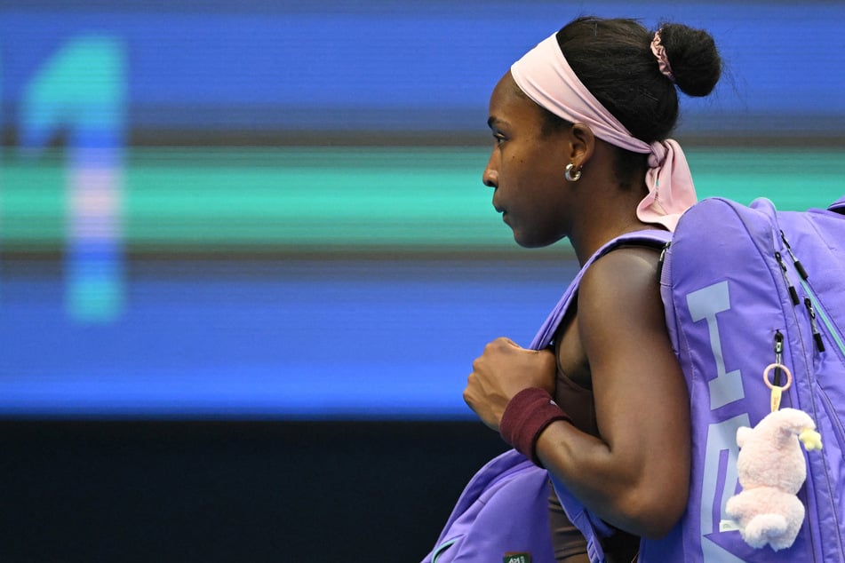 Coco Gauff leaves the court after losing her women's singles match against Belgium's Elise Mertens at the China Open on Wednesday. The US tennis star admitted that the horrific online abuse she faced was "draining" this week.
