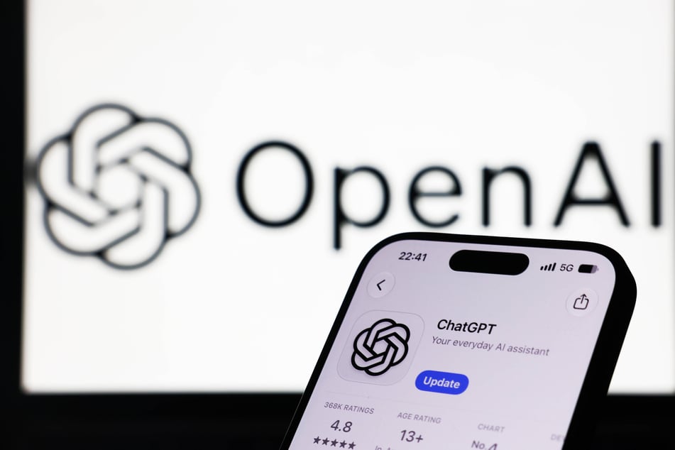 OpenAI logo displayed on a laptop screen and ChatGPT on App Store displayed on a phone screen are seen in this illustration photo taken in Krakow, Poland on October 16. The AI giant has revealed that two agents disabled or weakened their own safety monitors.