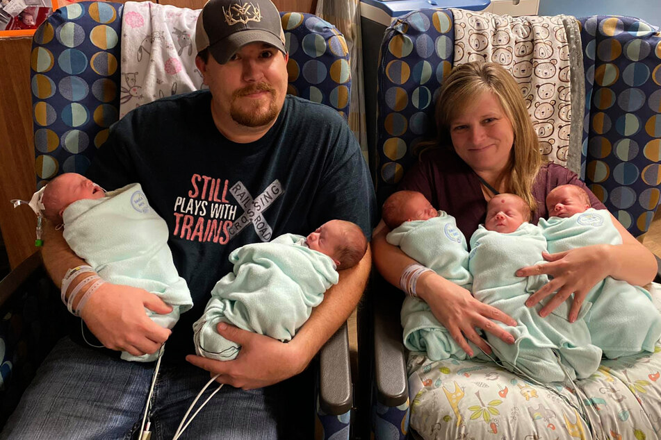 High five! Family more than doubles overnight as woman has quintuplets