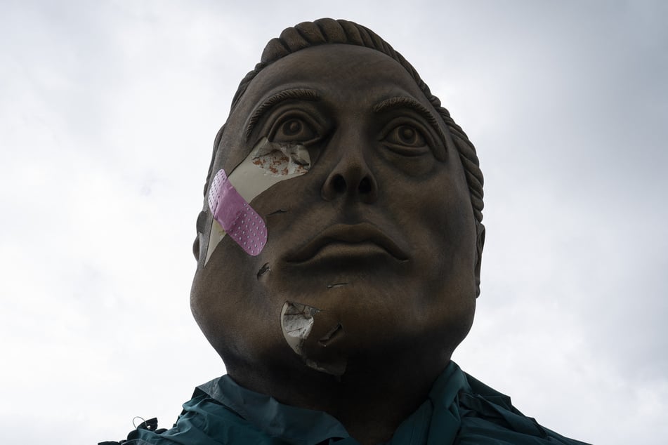A bust of Elon Musk that was recently vandalized is seen near the SpaceX projects in Brownsville, Texas, on May 3, 2025.