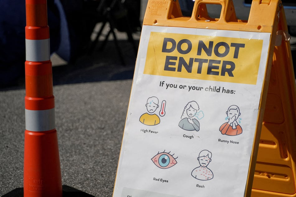 Measles signage stands outside a South Carolina Department of Public Health Mobile Health Unit in Spartanburg on February 6, 2026.