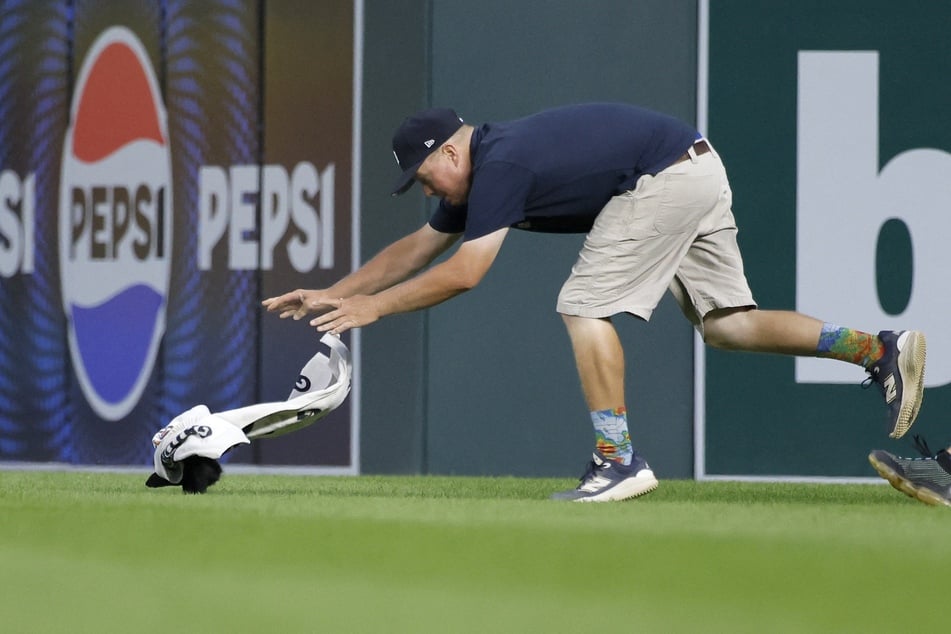 The staff tried to catch the squirrel, but he was just too fast.
