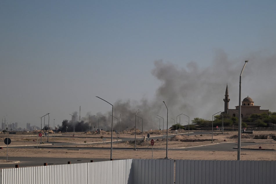 Smoke rises from a reported Iranian strike in the area where the US Embassy is located in Kuwait City on March 2, 2026.