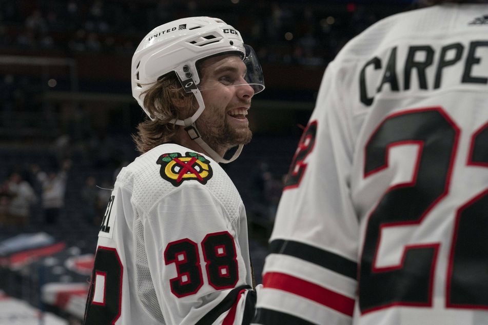 Brandon Hagel scored a goal and two assists as the Blackhawks beat the Predators in overtime 5-4