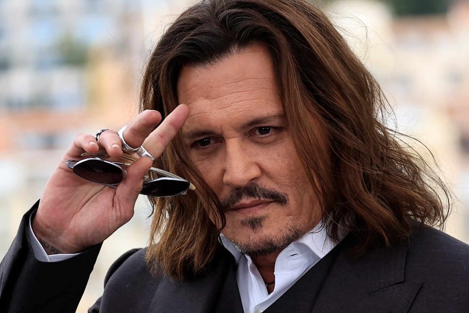 After his court battle with ex-wife Amber Heard, actor Johnny Depp (pictured) may be in love again!