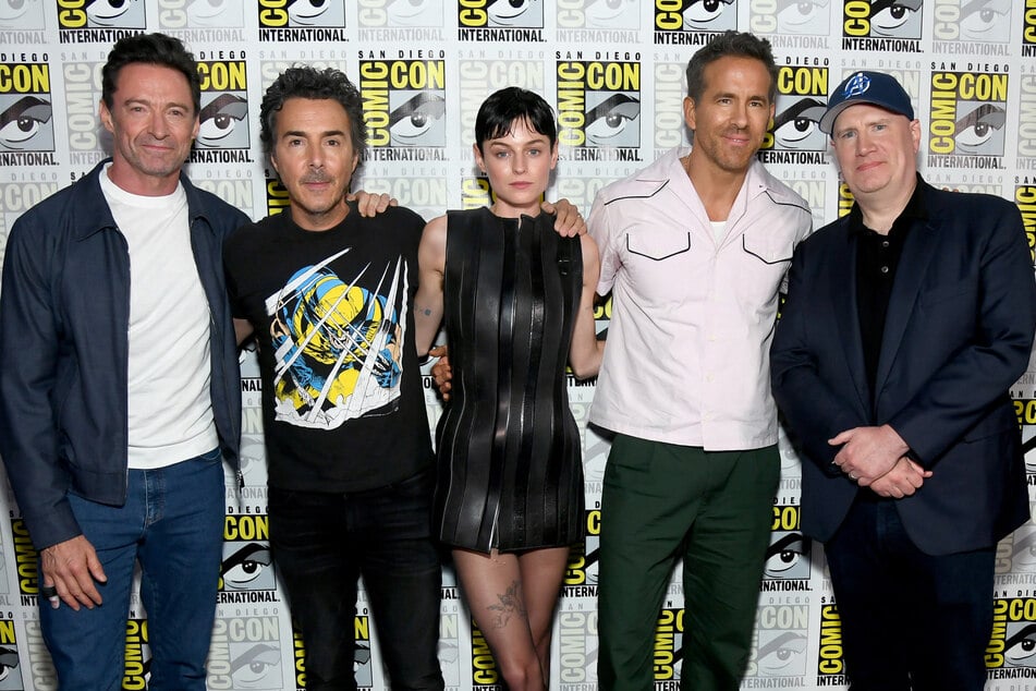 (L-R) Hugh Jackman, Shawn Levy, Emma Corrin, Ryan Reynolds, and President of Marvel Studios Kevin Feige attend Marvel Studios: The Ultimate Deadpool & Wolverine Celebration of Life in Hall H at SDCC in San Diego, California on Thursday.