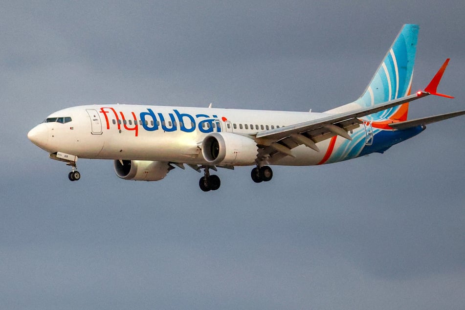 A flydubai Boeing 737 MAX 8 aircraft prepares for landing at Israel's Ben Gurion Airport on Wednesday. A passenger on a rerouted flydubai flight that was bound for Tel Aviv said one of the pilots tried to crash the plane and kill everyone on board.