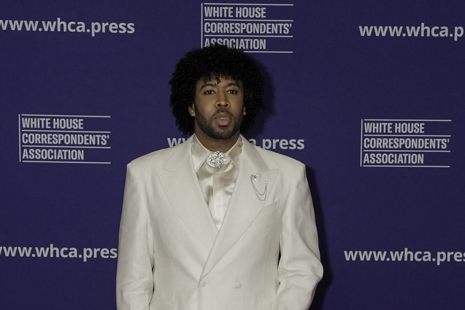 Eugene Daniels poses on the red carpet upon arrival for the annual White House Correspondents' Association Dinner on April 26, 2025.