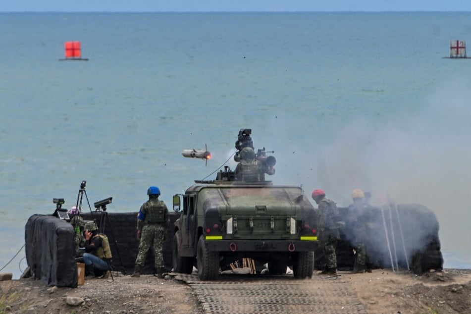 A Taiwanese soldier launches a US-made TOW A2 missile during a live firing exercise in Pingtung county on July 3, 2023.