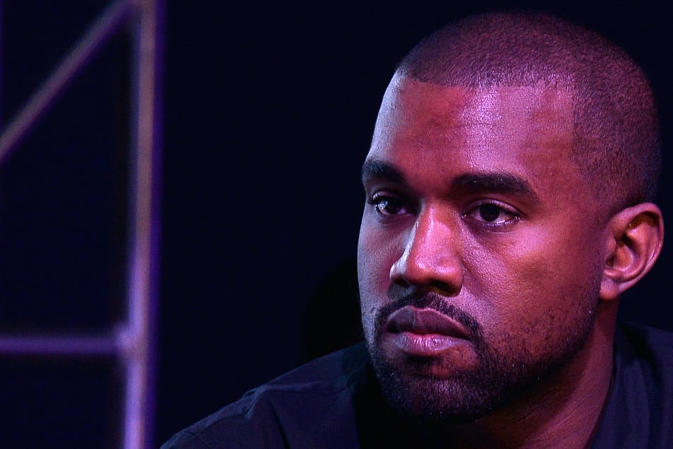 Kanye West seen with new lady after going "missing" for weeks