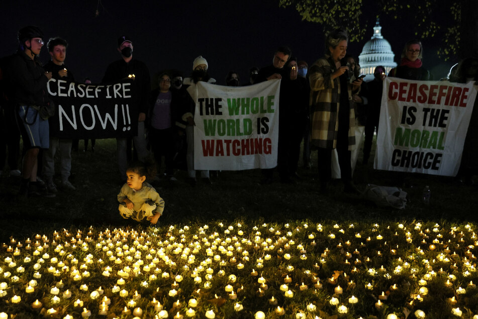 IfNotNow and Jewish Voice for Peace organized a candlelight ceasefire vigil outside the DNC building.