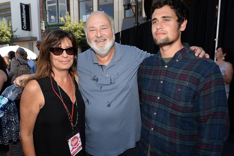 Rob Reiner (c.), wife Michele Singer (l.), and son Nick Reiner attend Teen Vogue's Back-to-School Saturday kick-off event in Los Angeles, California, on August 9, 2013.