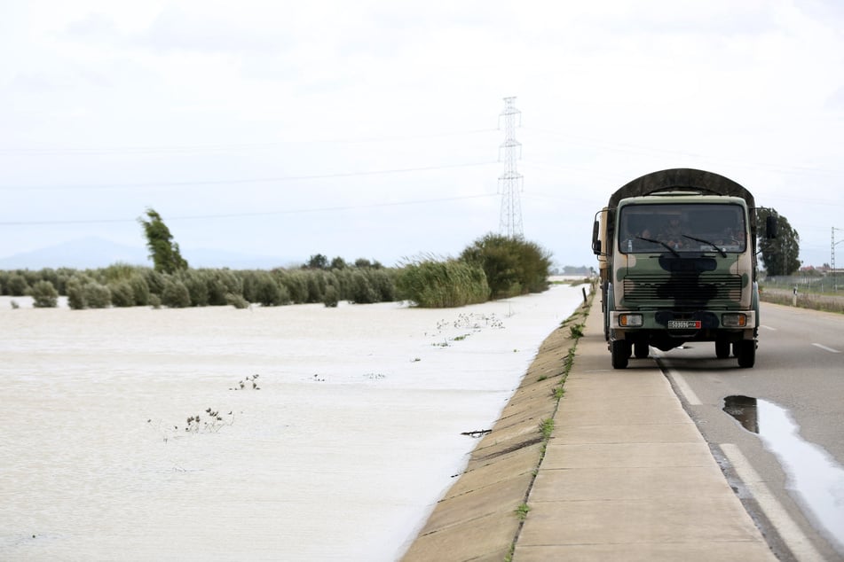 A military truck waits to evacuate residents from flood waters in northwestern Morocco. The country has now been accused of using surveillance to silence journalists and human rights defenders.