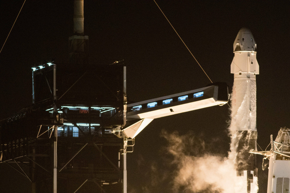 A SpaceX Falcon 9 rocket carrying Crew Dragon spacecraft launched from Cape Canaveral.