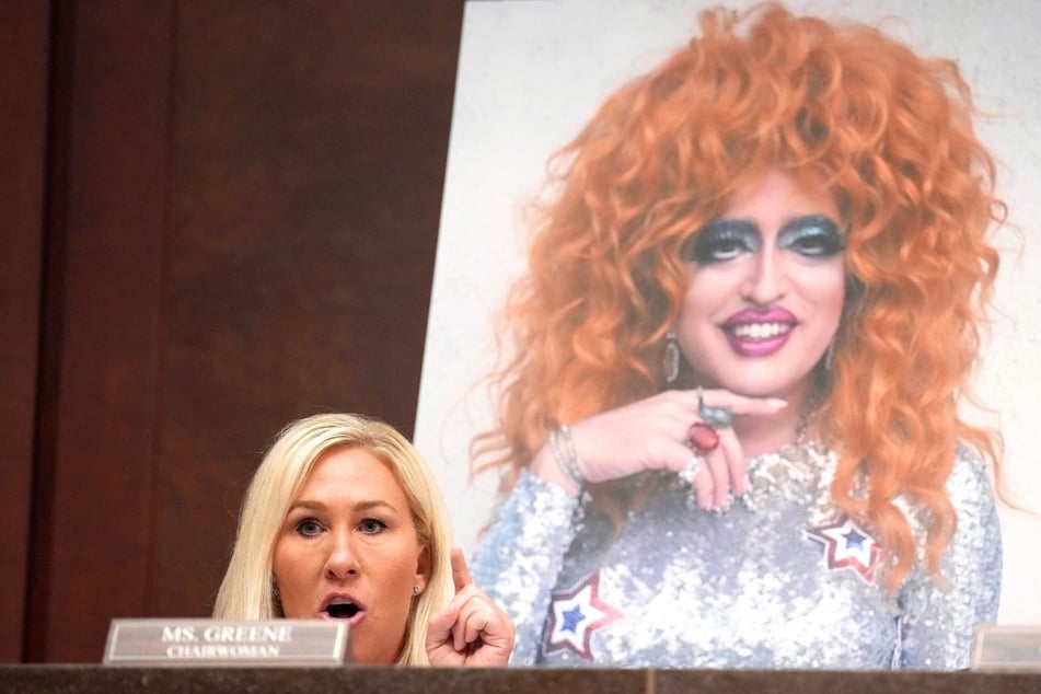 Marjorie Taylor Greene speaks in front of a photo of drag queen Lil Miss Hot Mess during a House Oversight Committee hearing on March 26, 2025 in Washington, DC.
