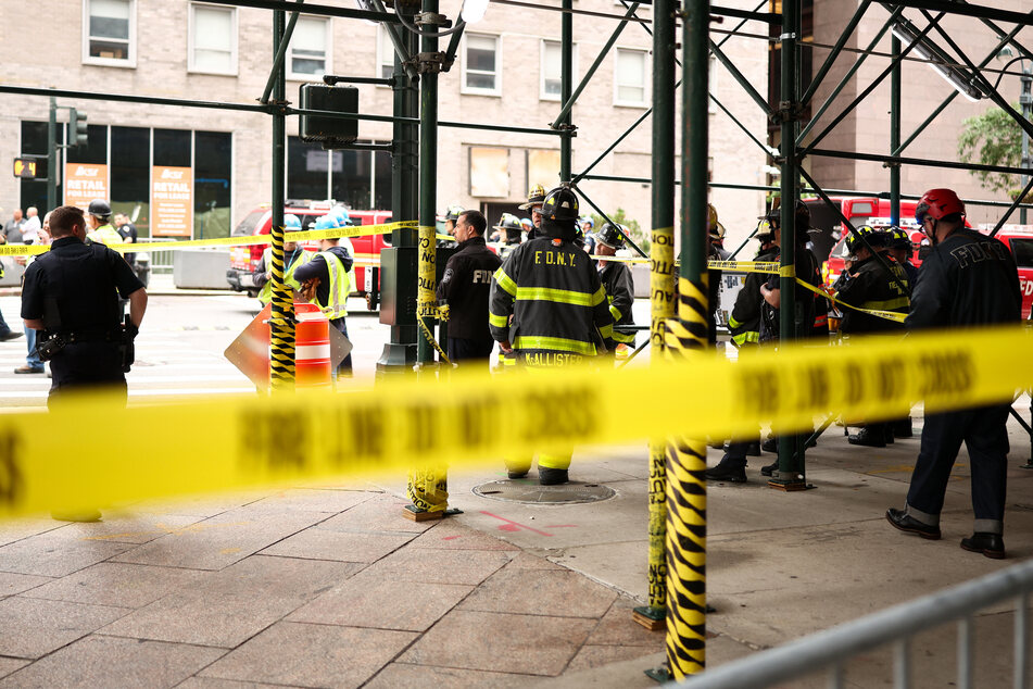 Firefighters from the New York City Fire Department (NYFD) respond to a building that has been evacuated in the Manhattan borough of New York City on Tuesday.
