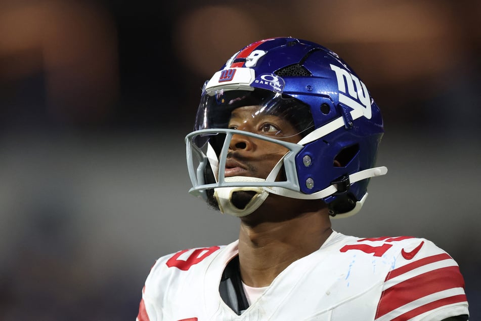 Jameis Winston of the New York Giants runs on to the field during the game against the Los Angeles Rams on September 21, 2026. He is stepping up as starting quarterback after Jaxson Dart's season-ending injury.