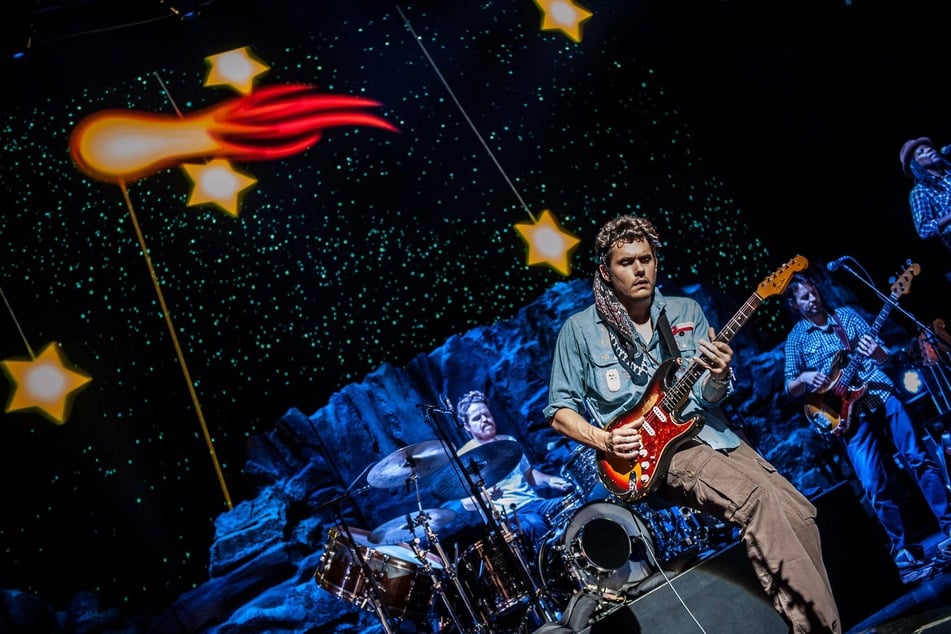 John Mayer taps into his inner '80s rock god in music video for Last Train Home
