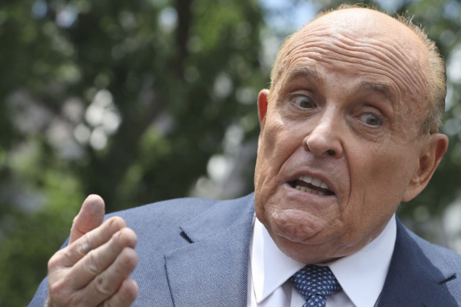 Rudy Giuliani: Video shows "assault" that led to arrest of supermarket worker