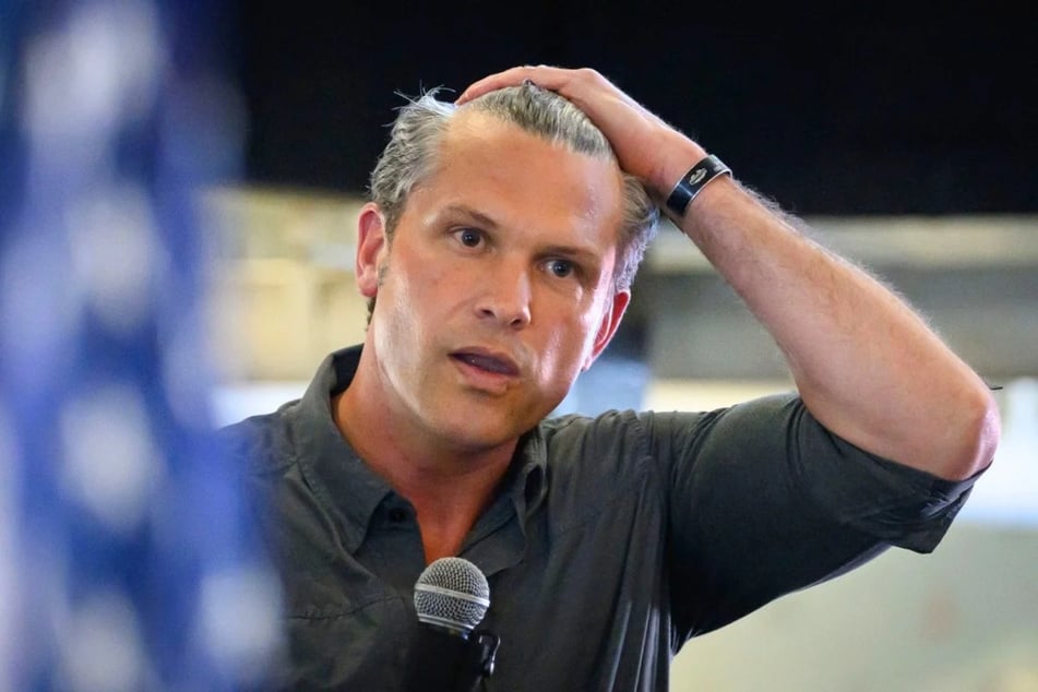 Pete Hegseth during a campaign event for Republican Congressional candidate Zach Nunn on August 17, 2026 in Des Moines, Iowa. In a recent video, Pete Hegseth urged military troops to register for mail-in voting, despite President Donald Trump's claims the practice is used to cheat.