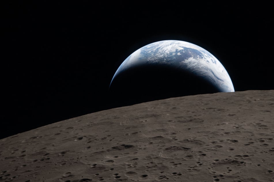 The Artemis II crew captured an "Earthset" in a stunning new photo released by NASA.