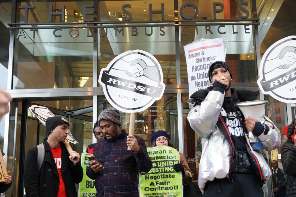 Chris Smalls leads protest against Amazon CEO Andy Jassy at DealBook Summit