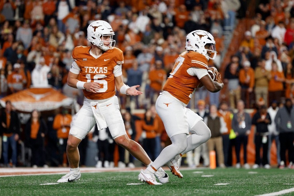 Arch Manning's (l) college football debut sent fans in to a frenzy.