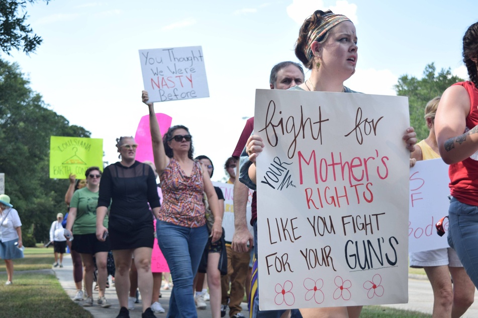Protesters march against abortion restrictions in Lafayette, Louisiana.