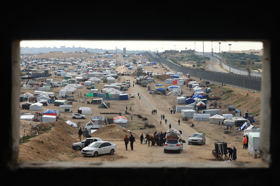 Nearly 1.5 million displaced Palestinians are trapped in Rafah – more than half of Gaza's population – seeking shelter in a sprawling makeshift encampment near the Egyptian border.