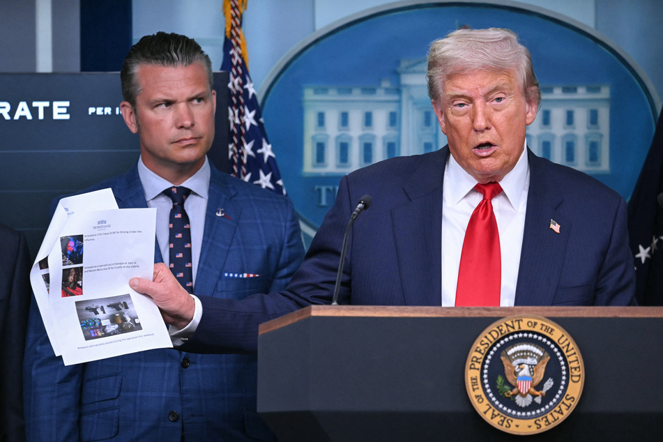 President Donald Trump (r.), alongside Secretary of Defense Pete Hegseth (l.), speaks during a news conference to discuss crime in Washington, DC on Monday.