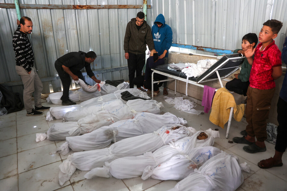 Israel accused of "blatant war crime" after strike on UN clinic in Gaza kills 19, including children