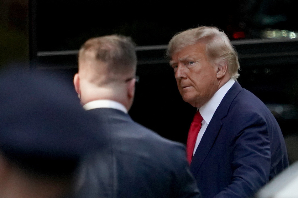 Donald Trump arrives for arraignment as judge rules on media access