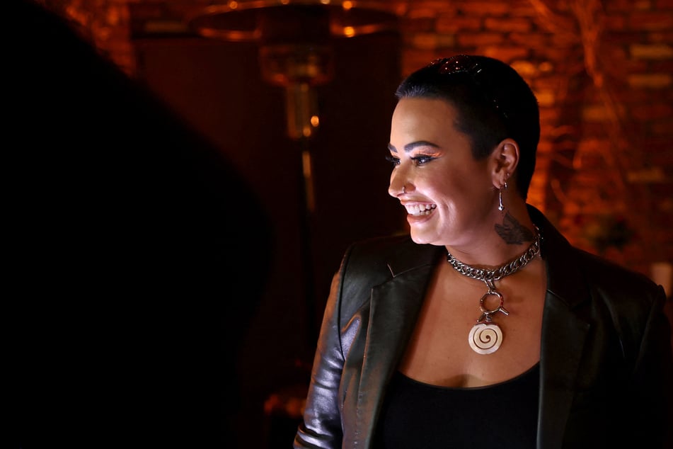 Demi Lovato is dating a "super great guy" who has something in common with her!