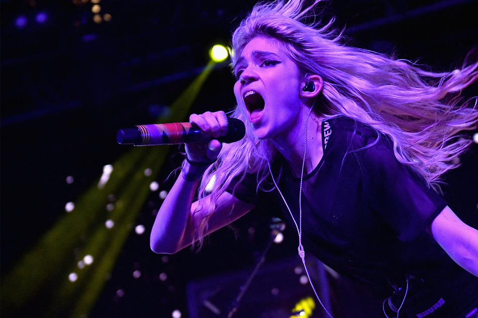 Grimes stuns fans with radical new face tattoo: "It's my fave tat"