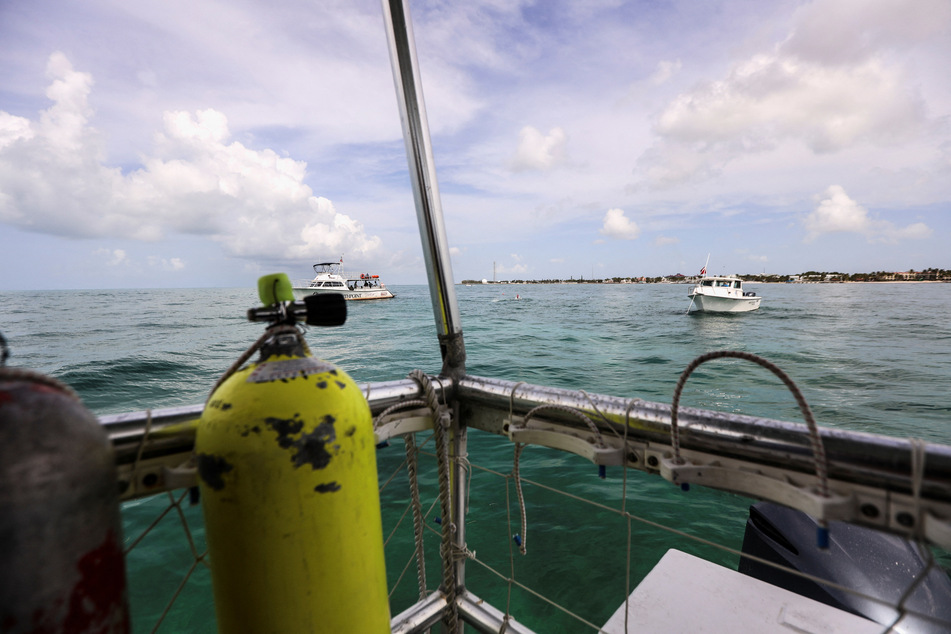 The world's oceans hit an all-time high temperature in July, while high water temperatures in Florida are threatening coral reefs.
