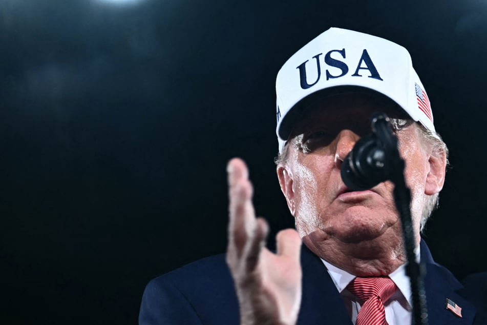 Democrats sues Trump over attempts to "intimidate and coerce" election officials