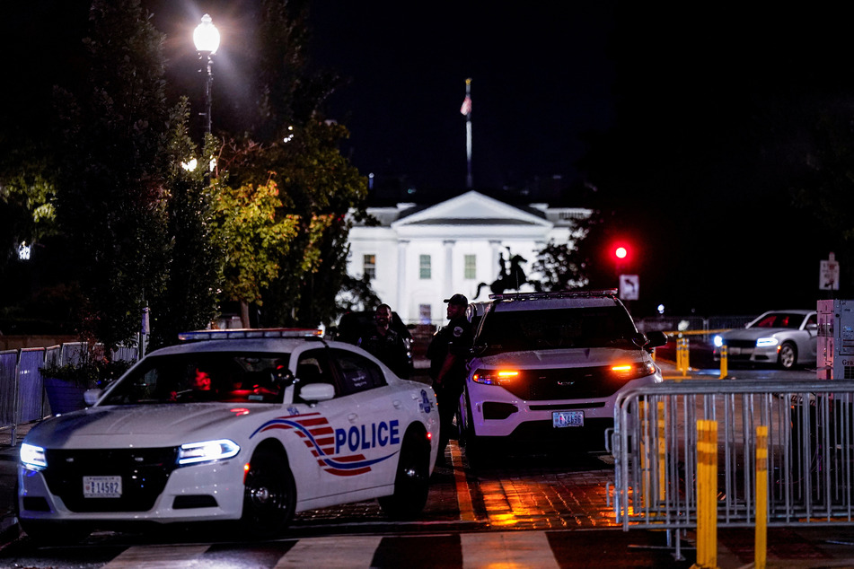 Metropolitan Police Department officers secure 16th Street near the White House, ahead of Ukrainian President Volodymyr Zelensky's visit, on August 17, 2025.