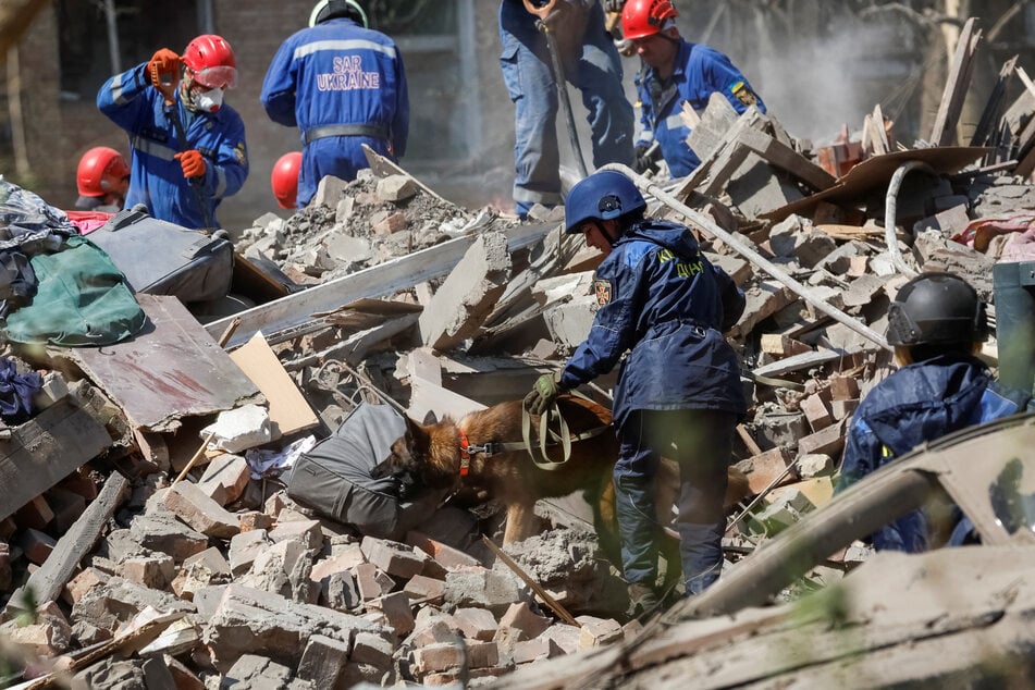 Search and rescue teams sifted through the rubble of buildings on Thursday, looking for survivors.