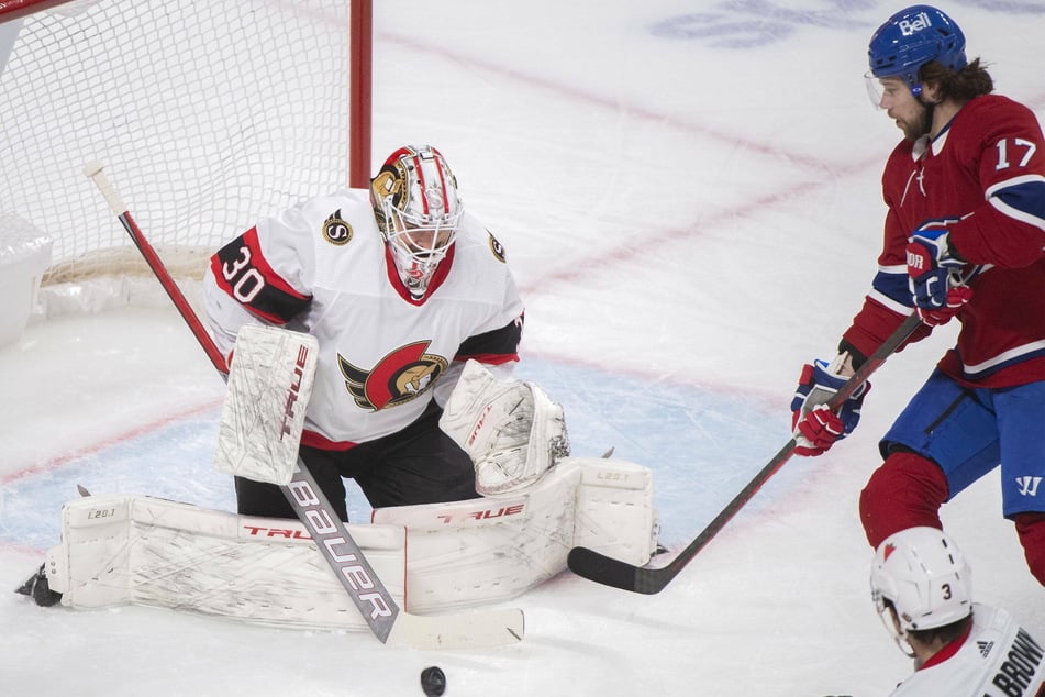 Ottawa Senators goaltender Matt Murray stops Montreal Canadiens right wing Josh Anderson during the Senators shutout victory
